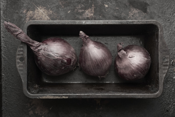 Image of red onions in loaf tin